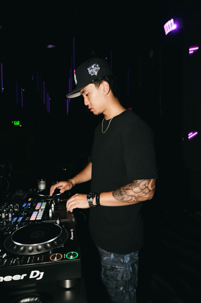 DJ SATO performing a dj set